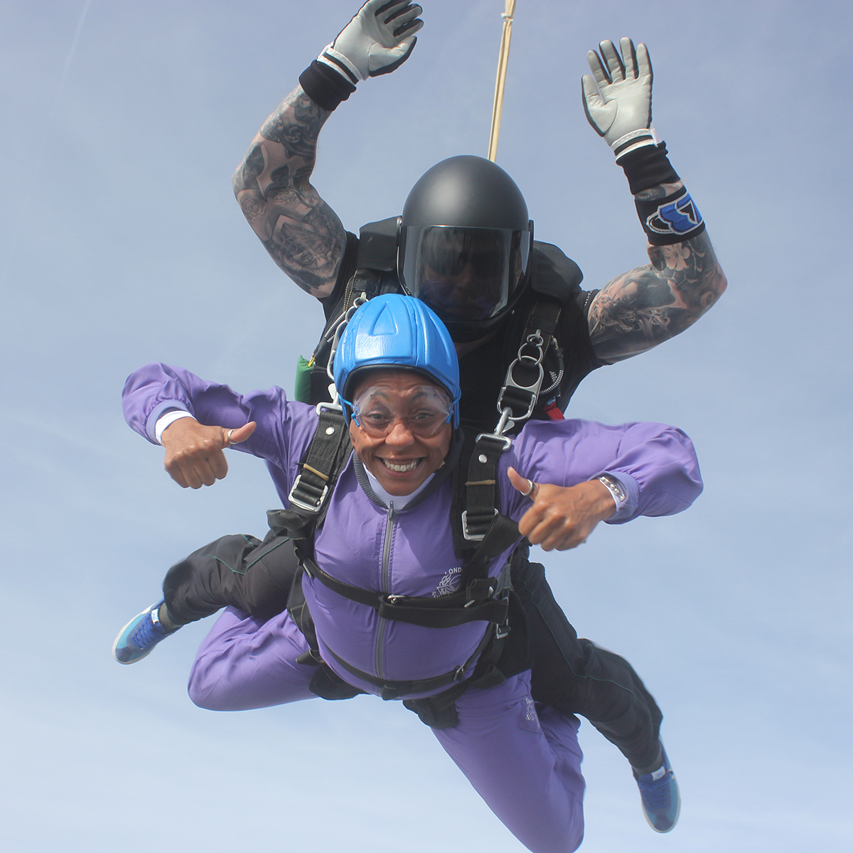 a man and woman skydiving