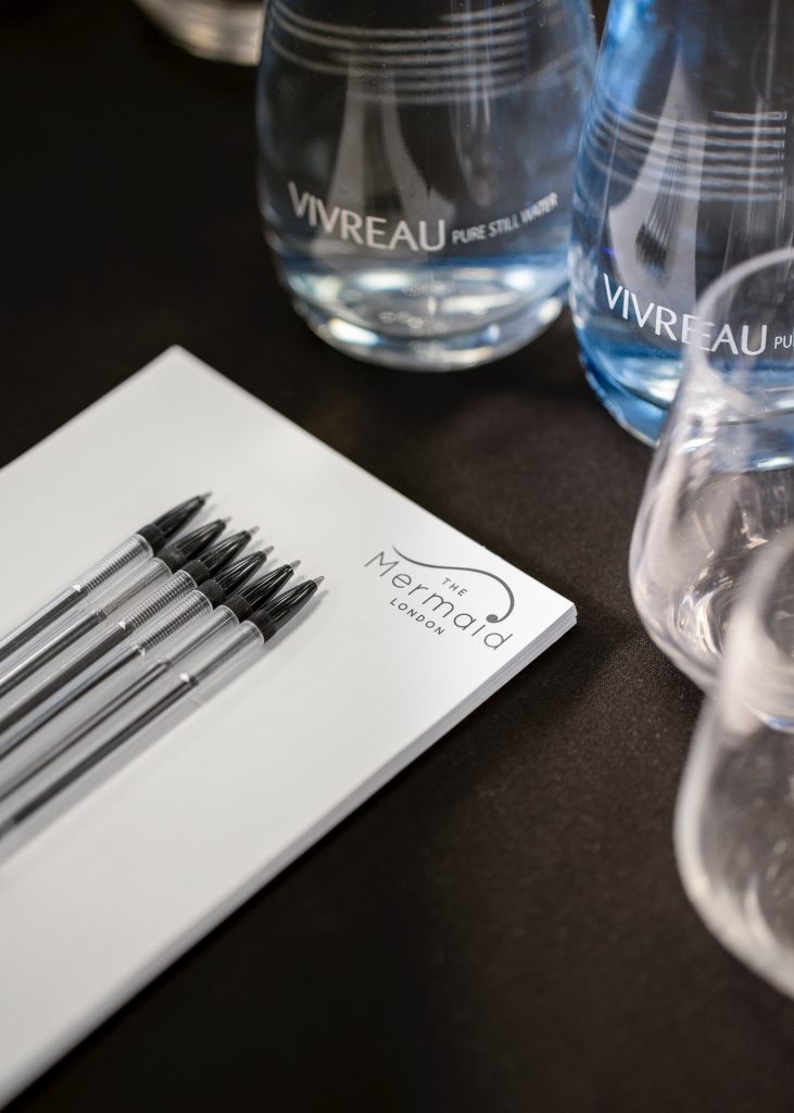 Events 2 a group of pens on a table